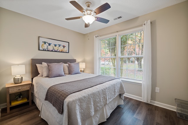 bedroom with neutral bedding and window