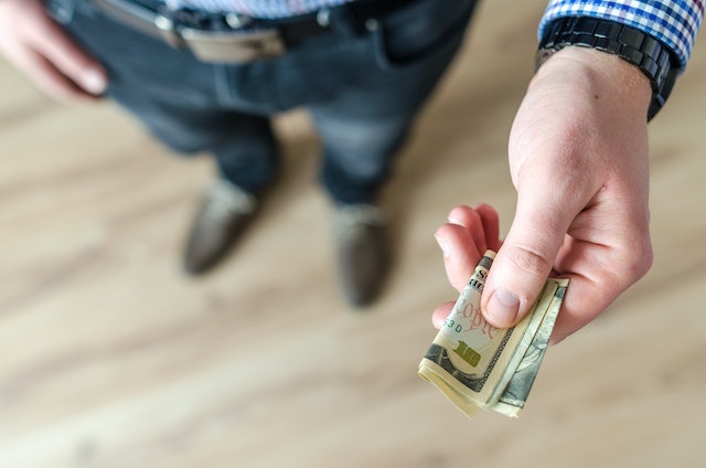 man holding money