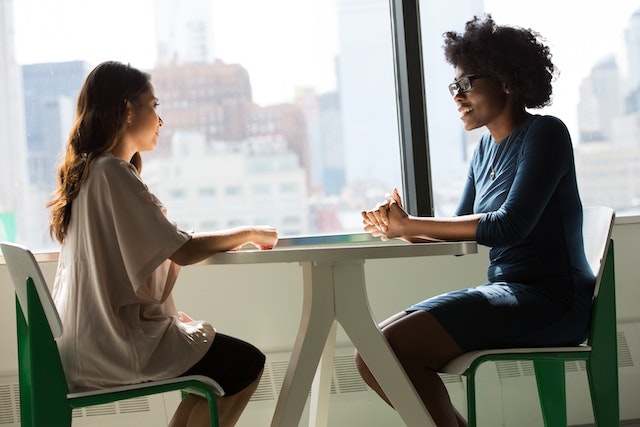 people sitting at table for interview-1