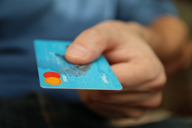 person paying with bank card